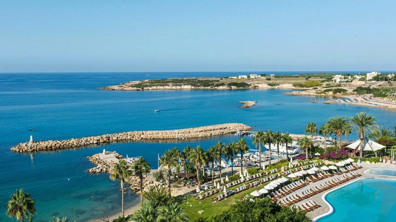 Swimming Pool and Beach (Coral Bay Hotel and Resort)